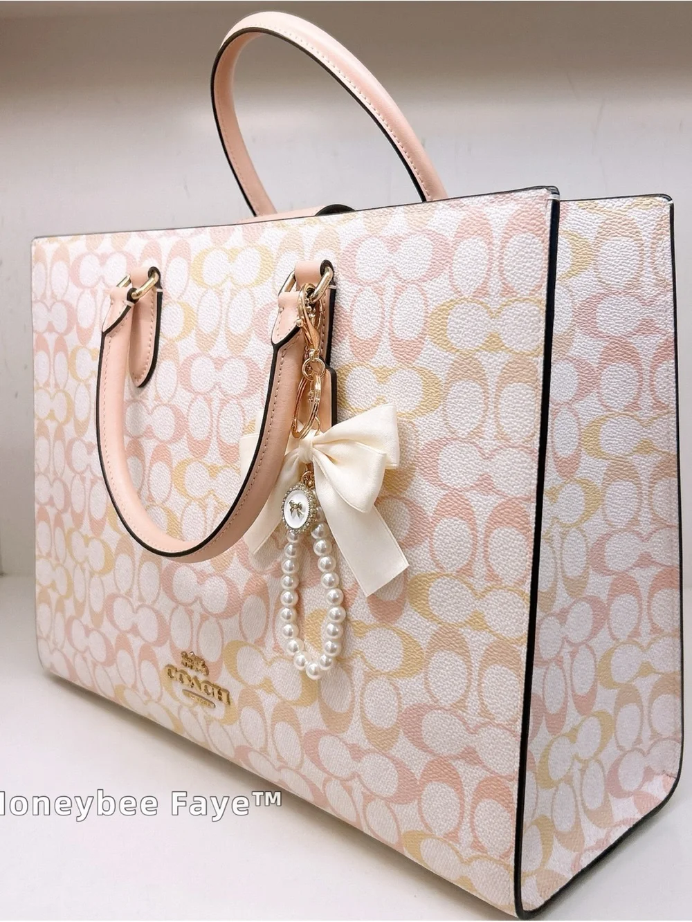 Coach Maggie tote Pink and Cream Signature Tote with Bow Pearl Charm large size